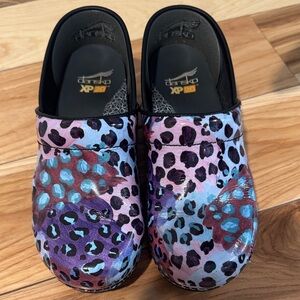 Dansko Multicolor Leopard Print Leather Clogs in Purple, Pink, Blue